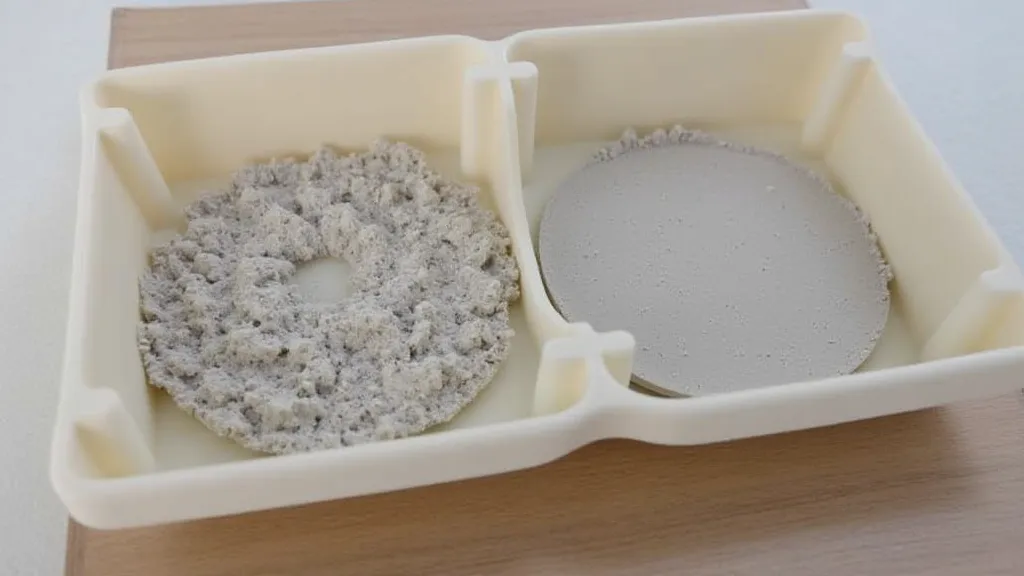 Coasters being removed from mold